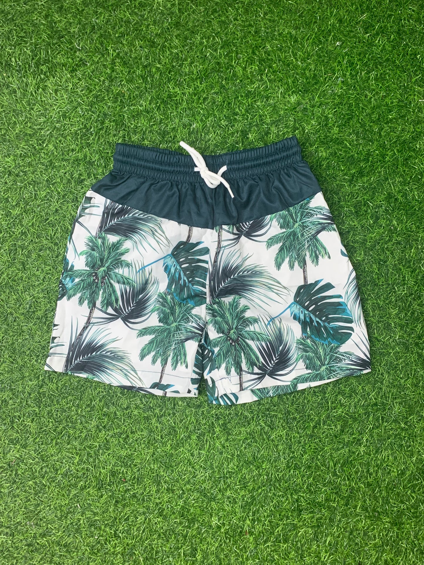 Green palm swim shorts