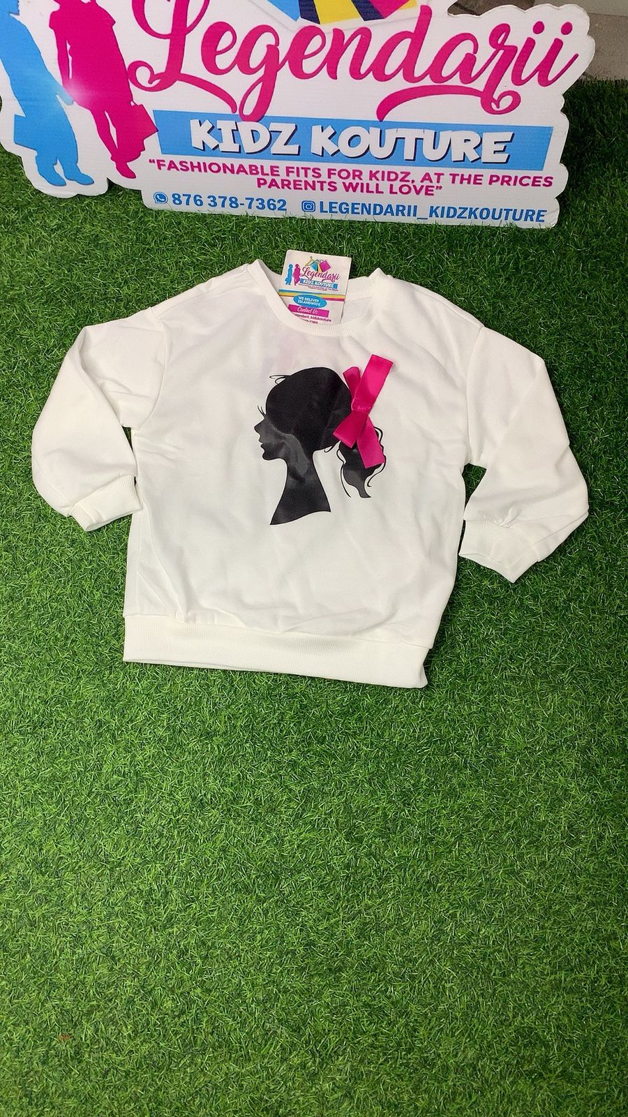 White with pink bow sweater top