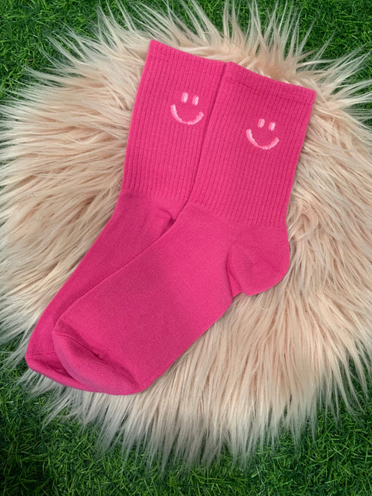 Pink smiley face socks